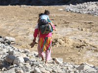 Nepali passengers traveling through the BP Highway, a major highway that connects Kathmandu directly with the Southern Plains of Nepal, make...