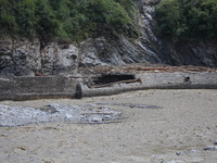 A section of BP Highway, a major highway that connects Kathmandu directly with the Southern Plains of Nepal, is damaged by a landslide in Ka...