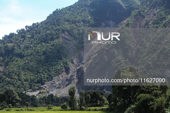 A section of BP Highway, a major highway that connects Kathmandu directly with the Southern Plains of Nepal, is damaged by a landslide in Ka...