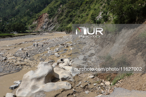 A section of BP Highway, a major highway that connects Kathmandu directly with the Southern Plains of Nepal, is damaged by a landslide in Ka...