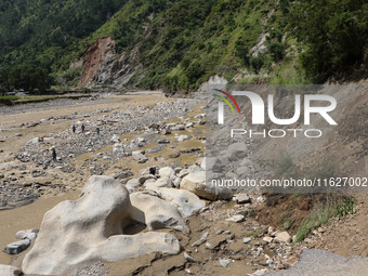 A section of BP Highway, a major highway that connects Kathmandu directly with the Southern Plains of Nepal, is damaged by a landslide in Ka...