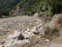 A section of BP Highway, a major highway that connects Kathmandu directly with the Southern Plains of Nepal, is damaged by a landslide in Ka...