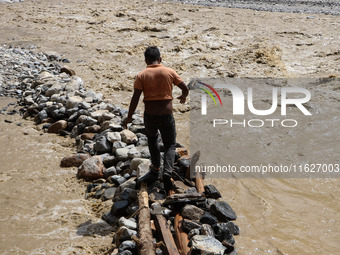 Nepali passengers traveling through the BP Highway, a major highway that connects Kathmandu directly with the Southern Plains of Nepal, make...