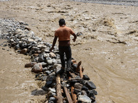 Nepali passengers traveling through the BP Highway, a major highway that connects Kathmandu directly with the Southern Plains of Nepal, make...