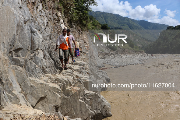 Nepali passengers traveling through the BP Highway, a major highway that connects Kathmandu directly with the Southern Plains of Nepal, make...