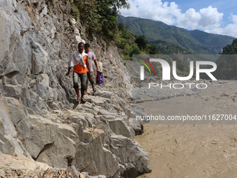 Nepali passengers traveling through the BP Highway, a major highway that connects Kathmandu directly with the Southern Plains of Nepal, make...