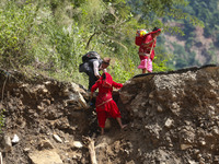 Nepali passengers traveling through the BP Highway, a major highway that connects Kathmandu directly with the Southern Plains of Nepal, make...