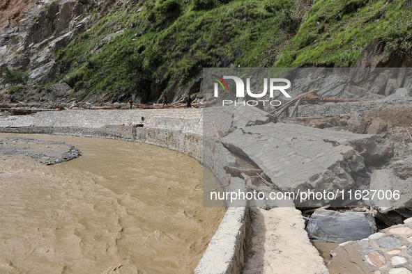 A section of BP Highway, a major highway that connects Kathmandu directly with the Southern Plains of Nepal, is damaged by a landslide in Ka...