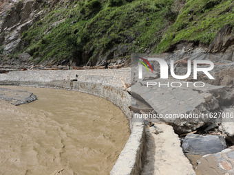 A section of BP Highway, a major highway that connects Kathmandu directly with the Southern Plains of Nepal, is damaged by a landslide in Ka...