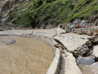 A section of BP Highway, a major highway that connects Kathmandu directly with the Southern Plains of Nepal, is damaged by a landslide in Ka...