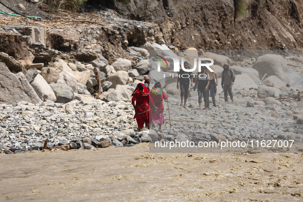 Nepali passengers traveling through the BP Highway, a major highway that connects Kathmandu directly with the Southern Plains of Nepal, make...