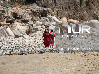 Nepali passengers traveling through the BP Highway, a major highway that connects Kathmandu directly with the Southern Plains of Nepal, make...