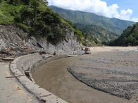 A section of BP Highway, a major highway that connects Kathmandu directly with the Southern Plains of Nepal, is damaged by a landslide in Ka...