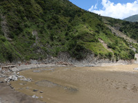 A section of BP Highway, a major highway that connects Kathmandu directly with the Southern Plains of Nepal, is damaged by a landslide in Ka...