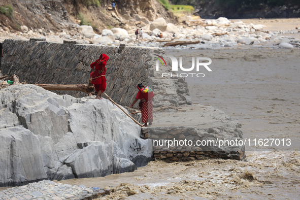 Nepali passengers traveling through the BP Highway, a major highway that connects Kathmandu directly with the Southern Plains of Nepal, make...