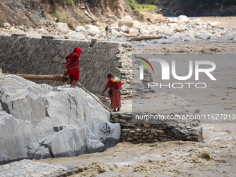 Nepali passengers traveling through the BP Highway, a major highway that connects Kathmandu directly with the Southern Plains of Nepal, make...