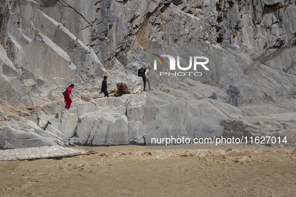 Nepali passengers traveling through the BP Highway, a major highway that connects Kathmandu directly with the Southern Plains of Nepal, make...