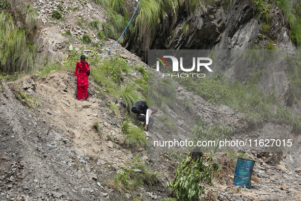 Nepali passengers traveling through the BP Highway, a major highway that connects Kathmandu directly with the Southern Plains of Nepal, make...