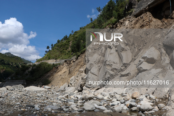 A section of BP Highway, a major highway that connects Kathmandu directly with the Southern Plains of Nepal, is damaged by a landslide in Ka...