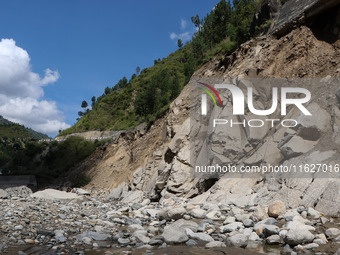 A section of BP Highway, a major highway that connects Kathmandu directly with the Southern Plains of Nepal, is damaged by a landslide in Ka...