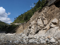 A section of BP Highway, a major highway that connects Kathmandu directly with the Southern Plains of Nepal, is damaged by a landslide in Ka...