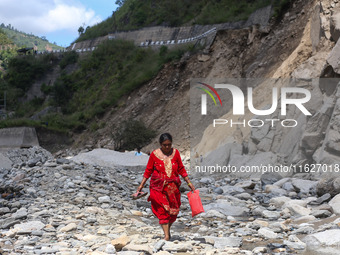 Nepali passengers traveling through the BP Highway, a major highway that connects Kathmandu directly with the Southern Plains of Nepal, make...