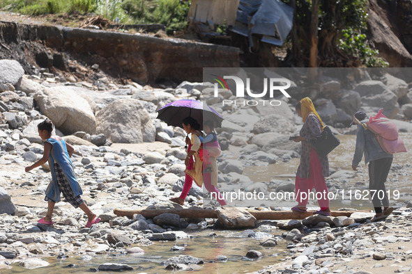 Nepali passengers traveling through the BP Highway, a major highway that connects Kathmandu directly with the Southern Plains of Nepal, make...