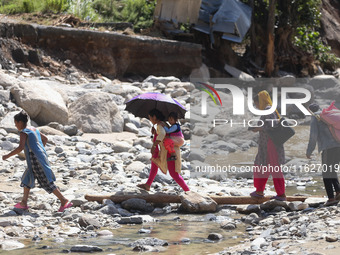 Nepali passengers traveling through the BP Highway, a major highway that connects Kathmandu directly with the Southern Plains of Nepal, make...