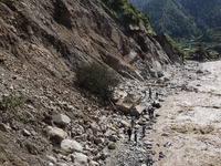 A section of BP Highway, a major highway that connects Kathmandu directly with the Southern Plains of Nepal, is damaged by a landslide in Ka...