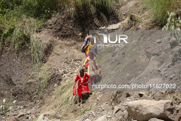 Nepali passengers traveling through the BP Highway, a major highway that connects Kathmandu directly with the Southern Plains of Nepal, make...