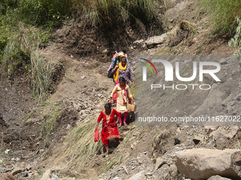 Nepali passengers traveling through the BP Highway, a major highway that connects Kathmandu directly with the Southern Plains of Nepal, make...