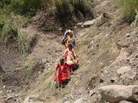 Nepali passengers traveling through the BP Highway, a major highway that connects Kathmandu directly with the Southern Plains of Nepal, make...