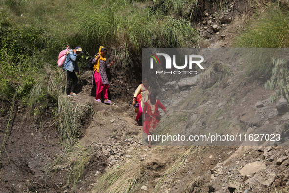 Nepali passengers traveling through the BP Highway, a major highway that connects Kathmandu directly with the Southern Plains of Nepal, make...