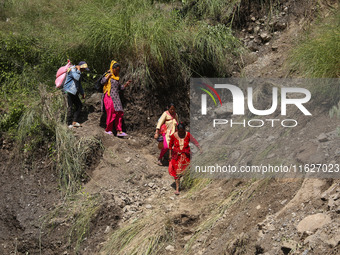 Nepali passengers traveling through the BP Highway, a major highway that connects Kathmandu directly with the Southern Plains of Nepal, make...