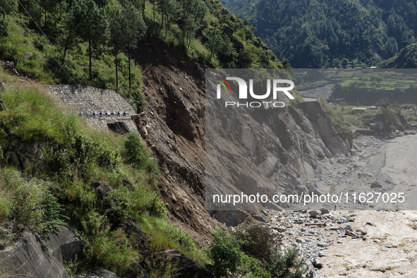 A section of BP Highway, a major highway that connects Kathmandu directly with the Southern Plains of Nepal, is damaged by a landslide in Ka...