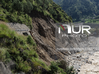 A section of BP Highway, a major highway that connects Kathmandu directly with the Southern Plains of Nepal, is damaged by a landslide in Ka...