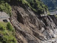 A section of BP Highway, a major highway that connects Kathmandu directly with the Southern Plains of Nepal, is damaged by a landslide in Ka...