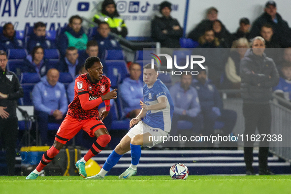 #14, Mickel Miller of Huddersfield turns #19, Taylor Gardner-Hickman of Birmingham as they battle for possession during the Sky Bet League 1...