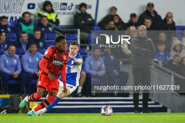 #14, Mickel Miller of Huddersfield turns #19, Taylor Gardner-Hickman of Birmingham as they battle for possession during the Sky Bet League 1...