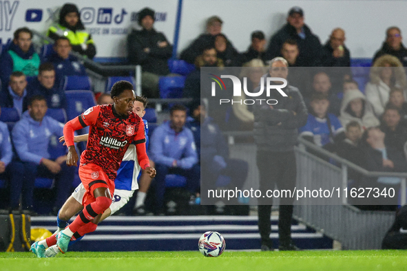 #14, Mickel Miller of Huddersfield turns #19, Taylor Gardner-Hickman of Birmingham as they battle for possession during the Sky Bet League 1...