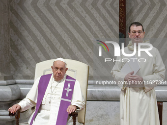 Pope Francis attends a vigil prayer in St. Peter's Basilica ahead of the start of the Synod of Bishops 16th General Assembly, at the Vatican...