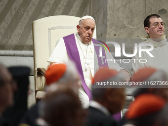 Pope Francis attends a vigil prayer in St. Peter's Basilica ahead of the start of the Synod of Bishops 16th General Assembly, at the Vatican...