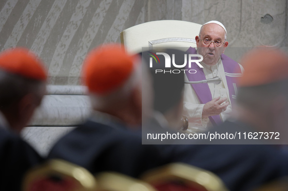 Pope Francis attends a vigil prayer in St. Peter's Basilica ahead of the start of the Synod of Bishops 16th General Assembly, at the Vatican...