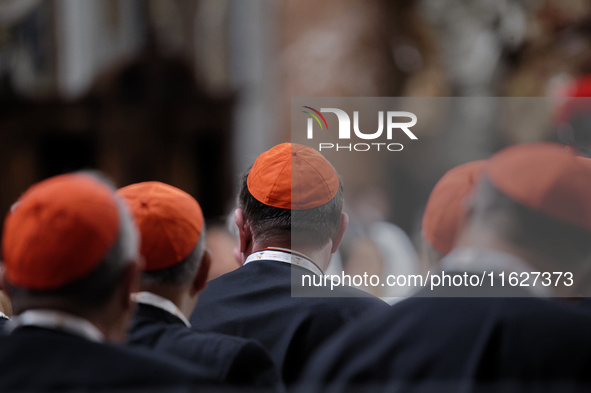 A group of Cardinals attend a vigil prayer in St. Peter's Basilica ahead of the start of the Synod of Bishops 16th General Assembly, at the...