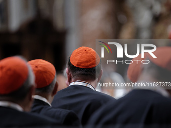 A group of Cardinals attend a vigil prayer in St. Peter's Basilica ahead of the start of the Synod of Bishops 16th General Assembly, at the...