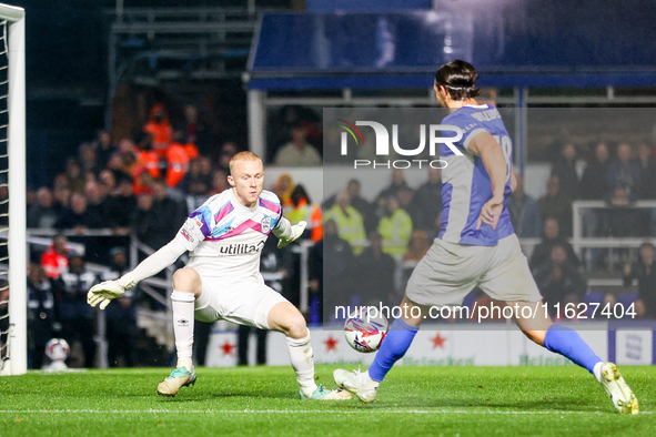 Jacob Chapman of Huddersfield denies Willum Por Willumsson of Birmingham the chance during the Sky Bet League 1 match between Birmingham Cit...