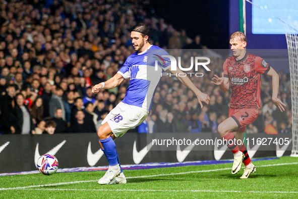 #18, Willum Por Willumsson of Birmingham is chased by #2, Lasse Sorensen of Huddersfield during the Sky Bet League 1 match between Birmingha...