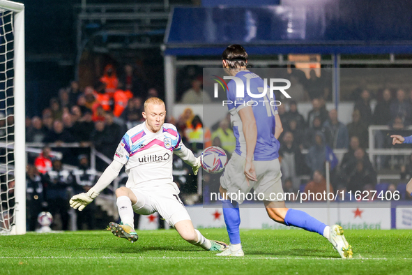 Jacob Chapman of Huddersfield denies Willum Por Willumsson of Birmingham the chance during the Sky Bet League 1 match between Birmingham Cit...