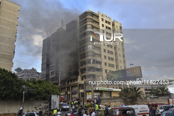 An apartment block lies in partial ruins after being hit by an Israeli airstrike in Beirut, Lebanon, on October 1, 2024. After escalating st...