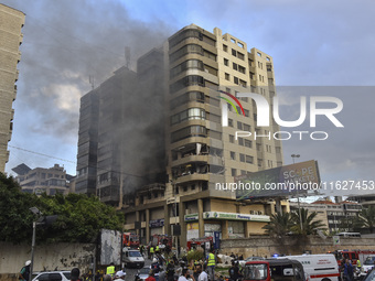 An apartment block lies in partial ruins after being hit by an Israeli airstrike in Beirut, Lebanon, on October 1, 2024. After escalating st...